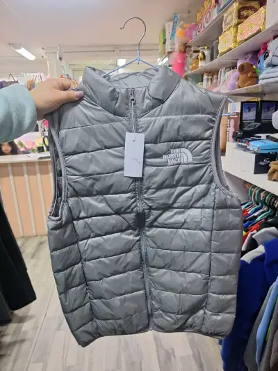 Chaleco sin mangas The North Face gris - miniatura 1