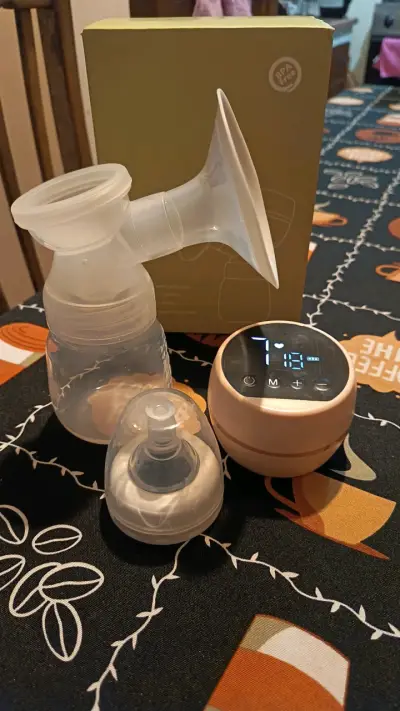 Extractor de leche eléctrico portátil con pantalla LED - miniatura 2