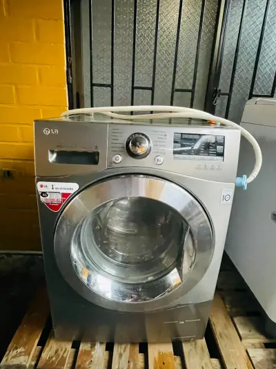 Lavadora secadora LG 9kilos de lavado 5kilos secad - miniatura 1
