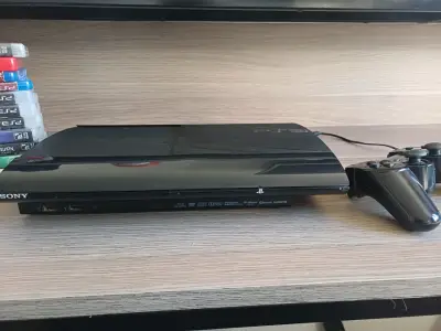 Consola PlayStation 3 superslim con juegos y mando - miniatura 1