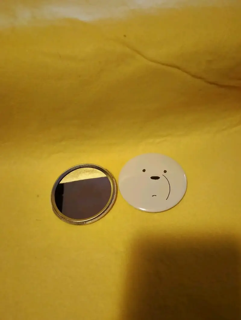 Espejo compacto con diseño de oso
