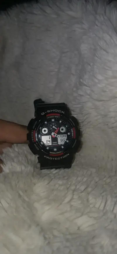 Reloj Casio G-Shock modelo GA-100 - miniatura 1