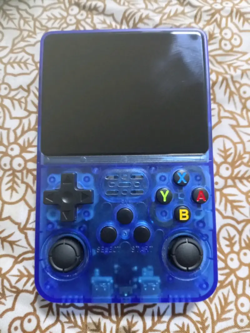 Consola portátil retro azul con juegos integrados - 1