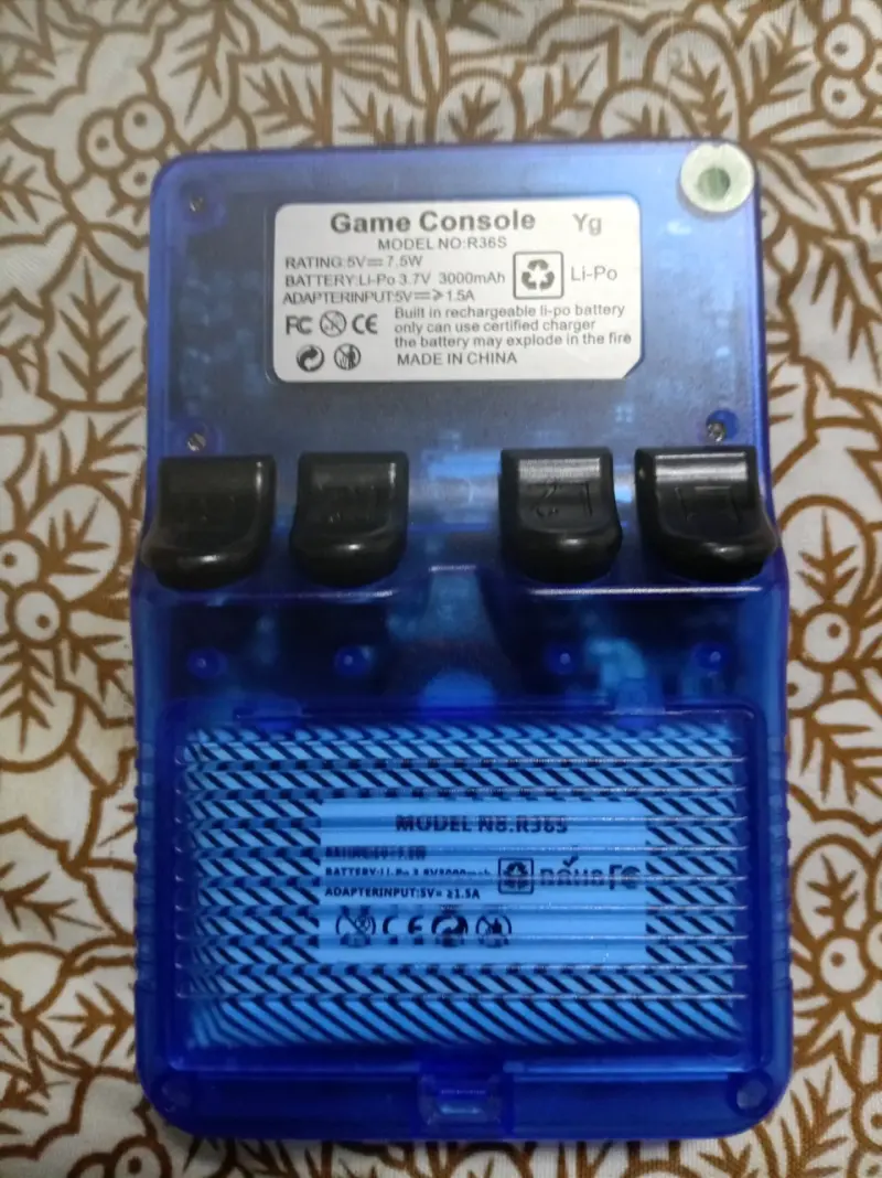 Consola portátil retro azul con juegos integrados - 2