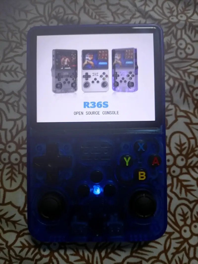 Consola portátil retro azul con juegos integrados - 3