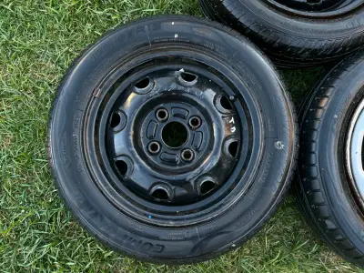 Llanta de acero con neumático 155/65R13 - miniatura 1