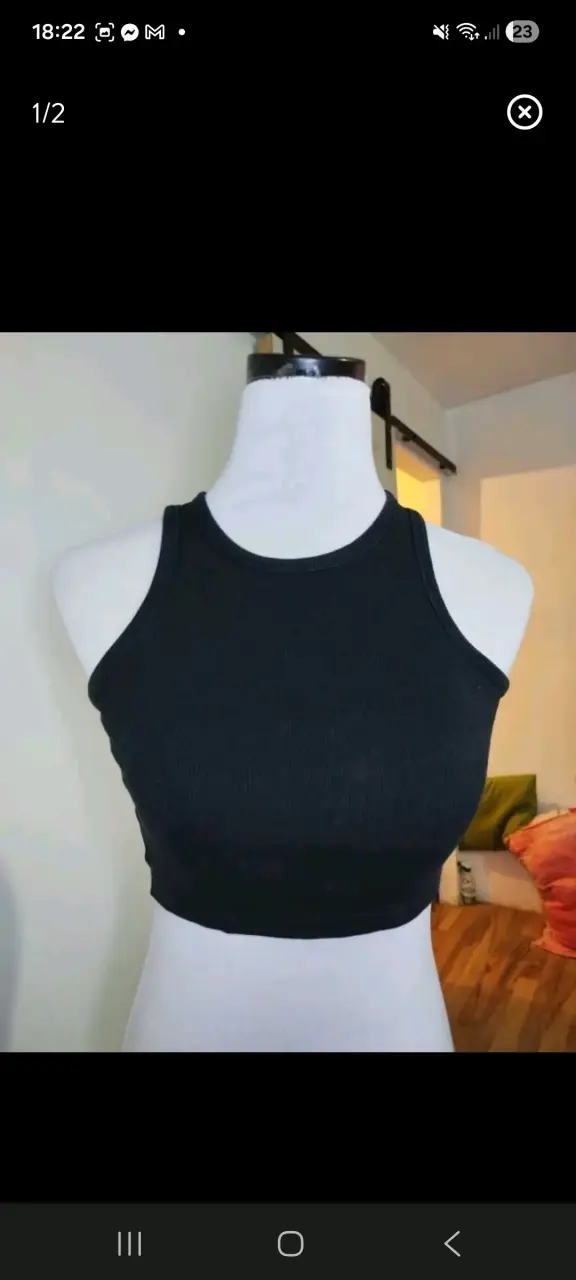 Top negro sin mangas para mujer