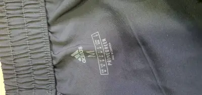 Pantalones deportivos Adidas azul marino con franjas - miniatura 3