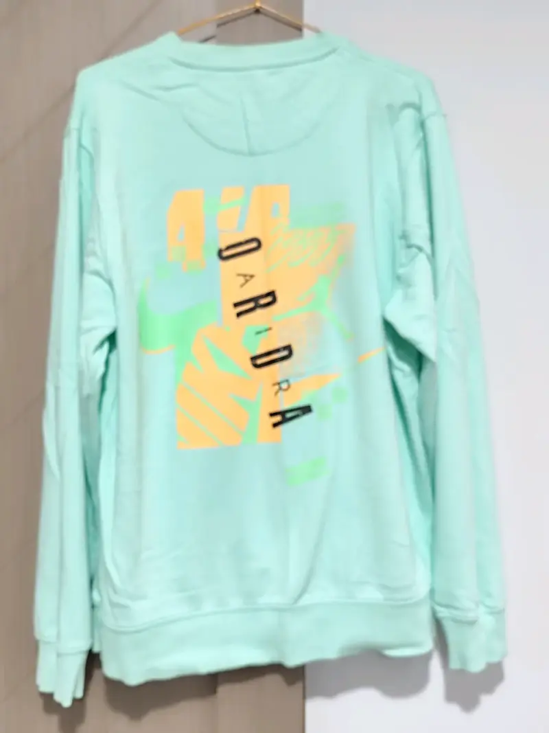 Polerón verde menta unisex con diseño gráfico - 2