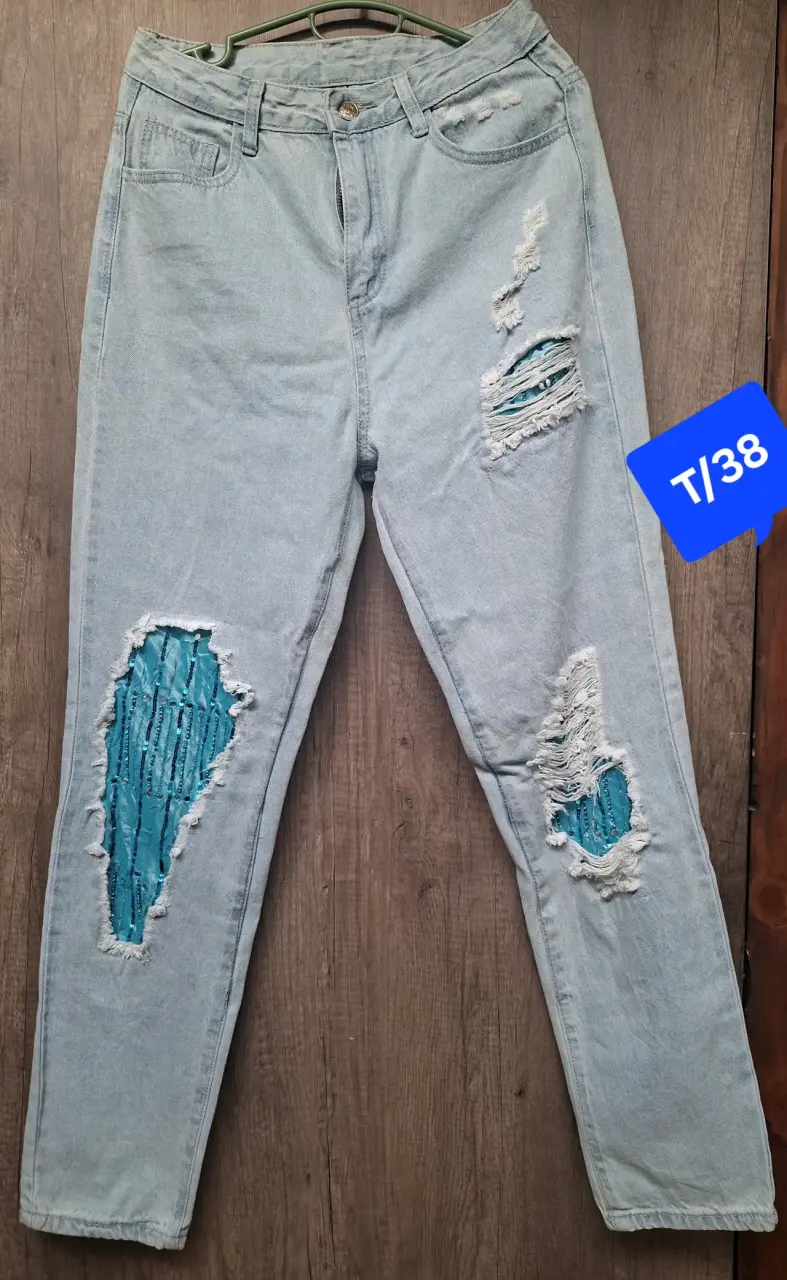 Jeans rasgados celestes talla 38