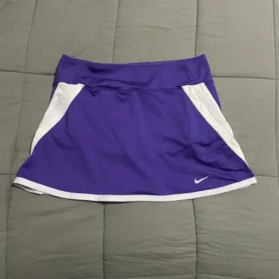Falda deportiva morada Nike - miniatura 1