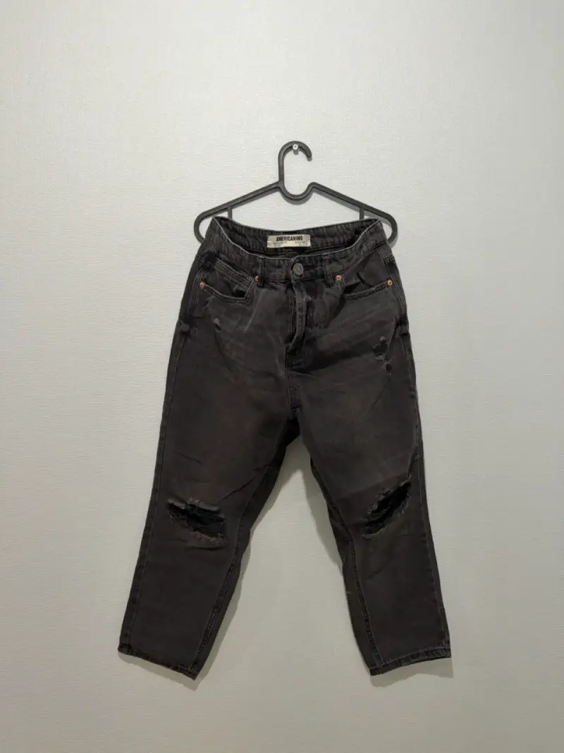 Jeans negros desgastados para hombre Americano