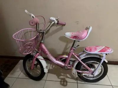 Bicicleta infantil rosada con canasto - miniatura 1