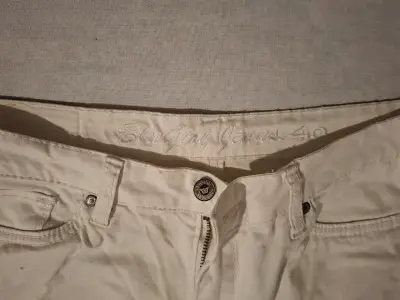 Pantalones de mezclilla blancos para mujer - miniatura 2