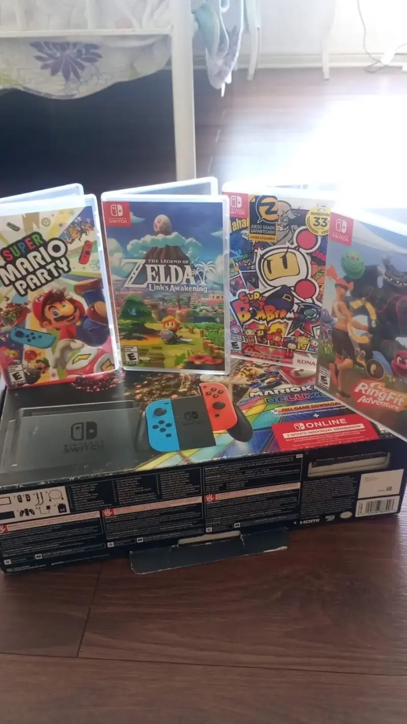 Consola Nintendo Switch con juegos y accesorios - 1
