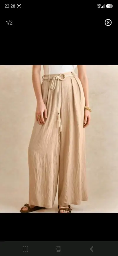 Pantalones palazzo beige con cinturón de cuerda - miniatura 1