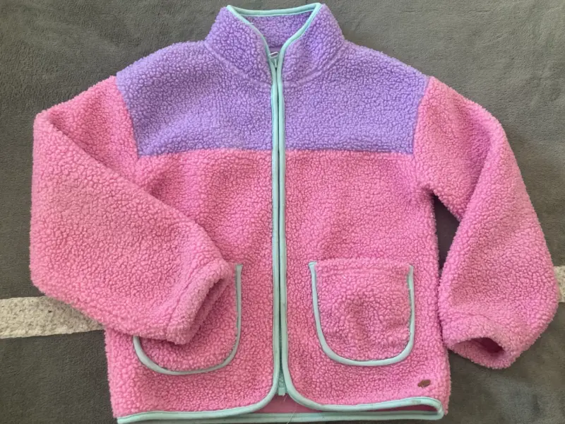 Chaqueta polar infantil rosada y lila