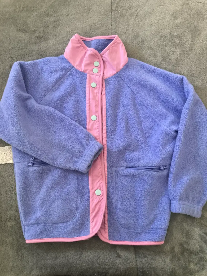 Chaqueta polar infantil bicolor azul y rosado