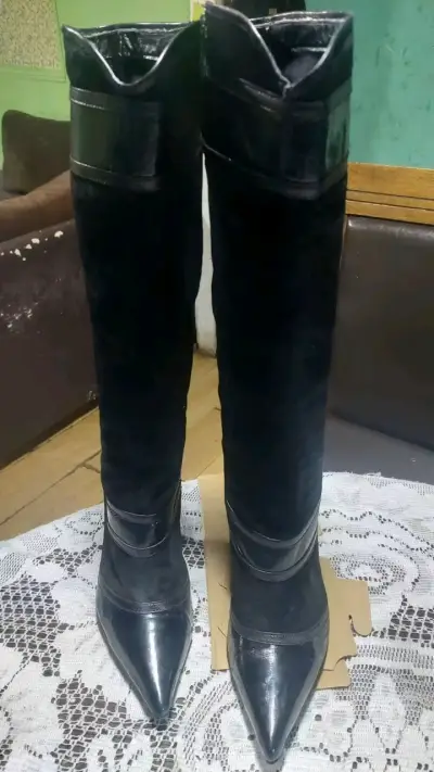 Botas negras de cuero para mujer - miniatura 1