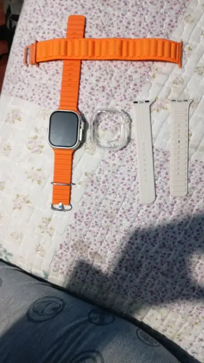 Reloj inteligente con correa naranja vibrante - miniatura 3
