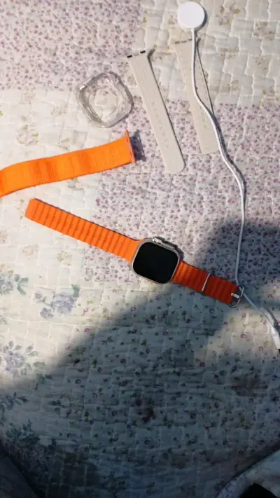 Reloj inteligente con correa naranja vibrante - miniatura 6