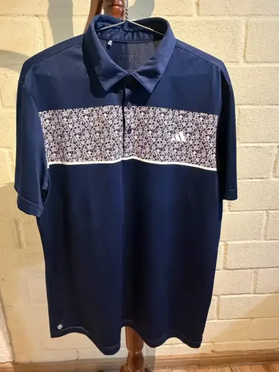 Polera Polo Adidas Azul con Diseño Floral - miniatura 1