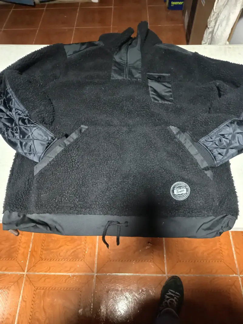 Chaqueta impermeable azul con capucha - 5