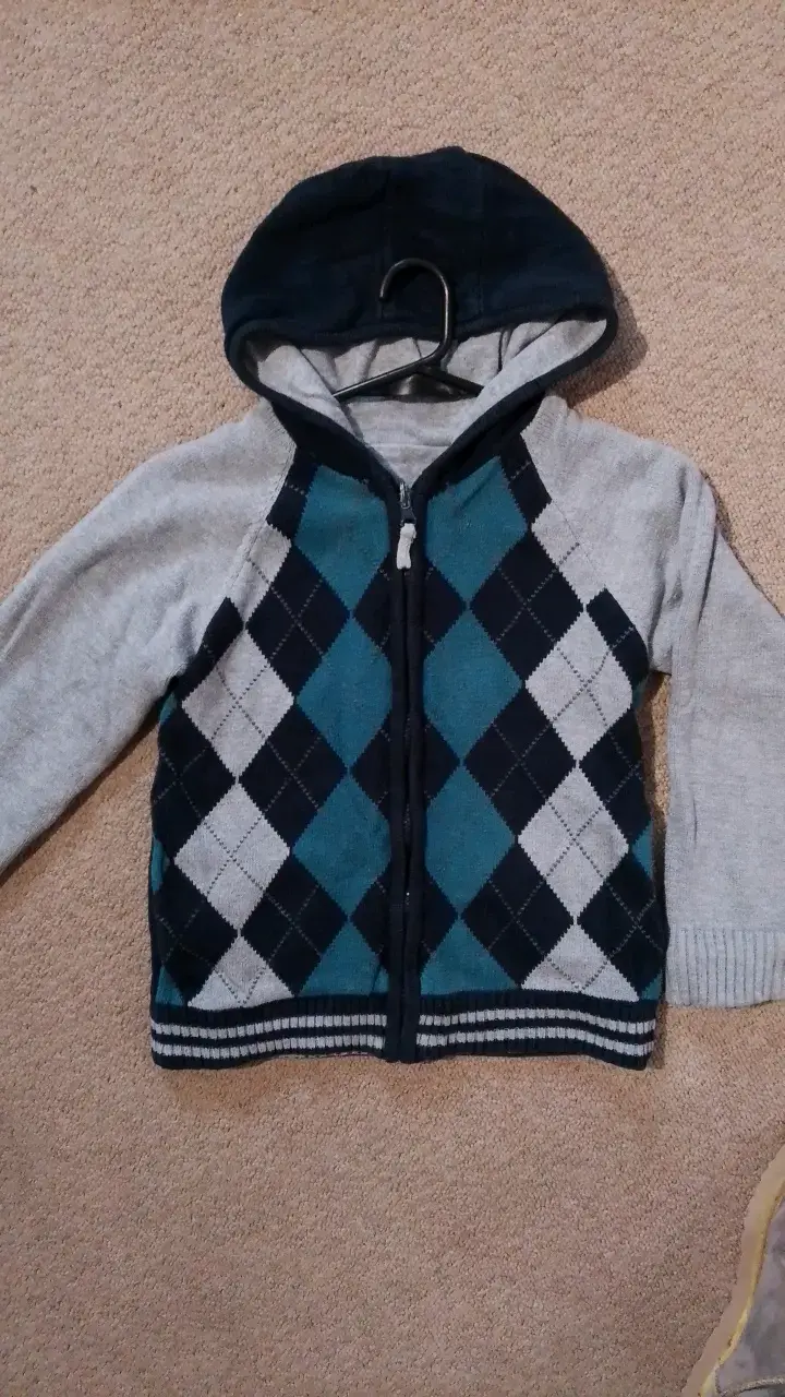 Chaleco reversible infantil con capucha y rombos