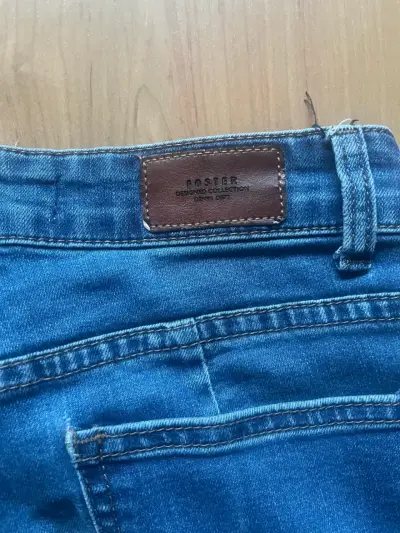 Jeans de mezclilla azul con bordes como flequillos - miniatura 3