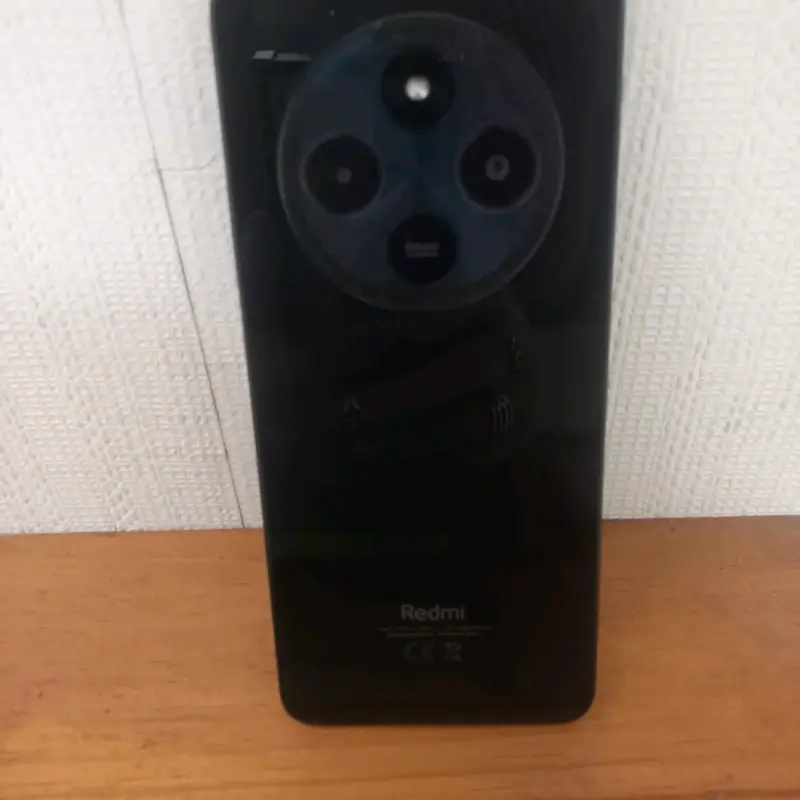 Smartphone Redmi 14c con triple cámara trasera - 1