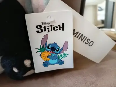 Peluche Stitch disfrazado de panda Miniso - miniatura 4