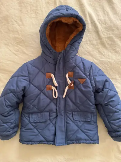 Chaqueta acolchada azul para niños con capucha - miniatura 1