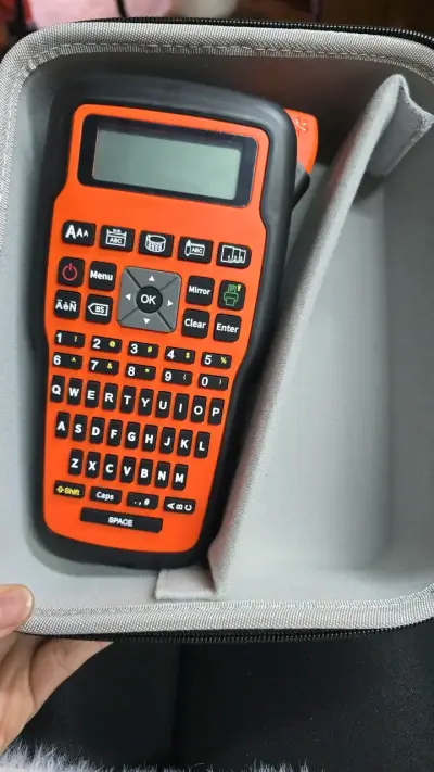 Rotuladora portátil electrónica naranja - miniatura 1