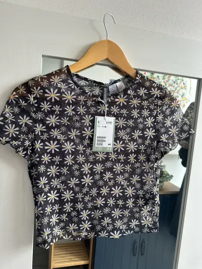 Polera floral transparente H&M para mujer - miniatura 1