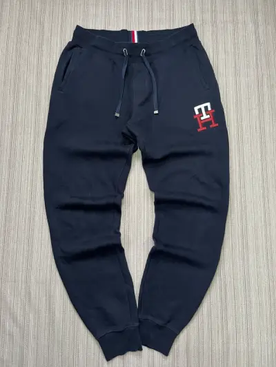 Pantalones deportivos azul marino con logo - miniatura 1