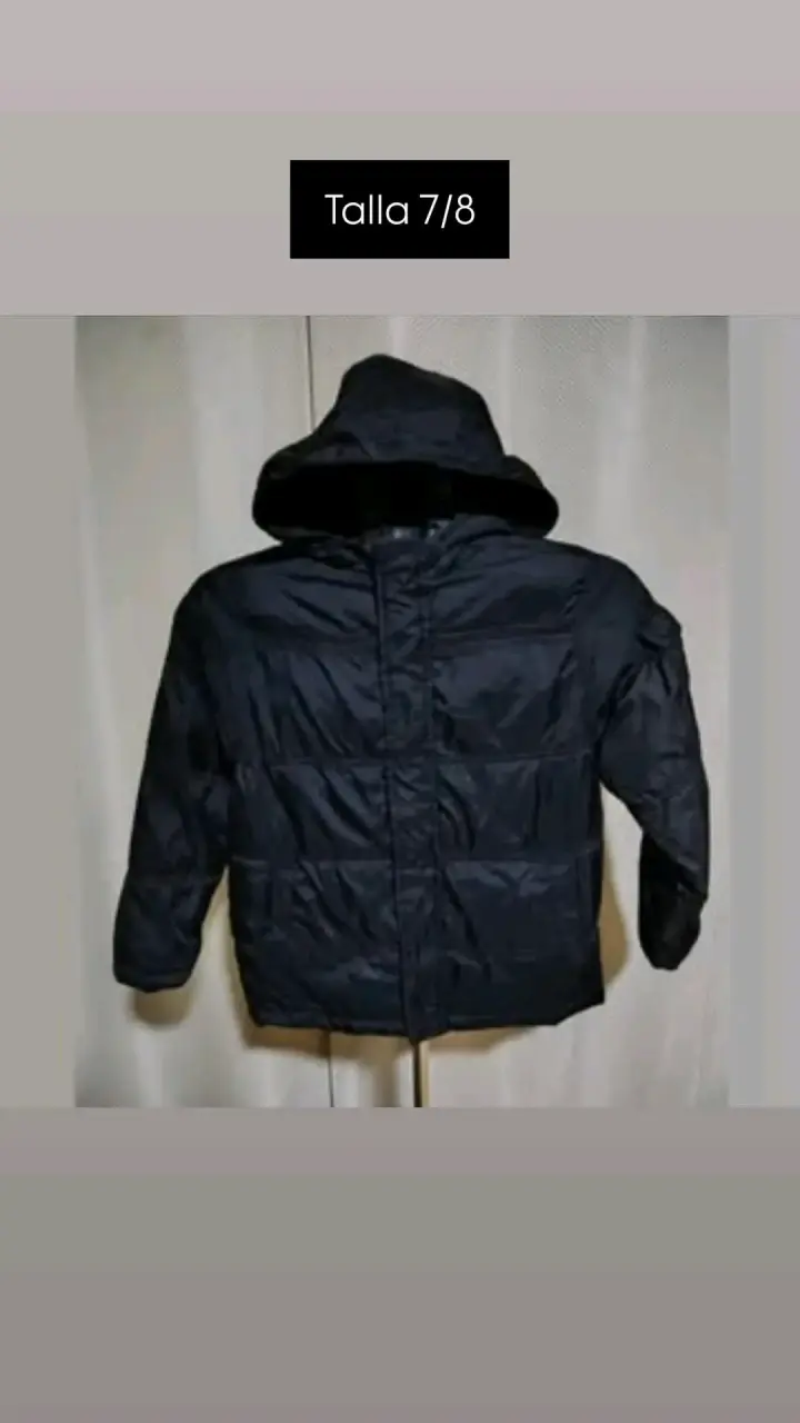 Chaqueta impermeable para niño talla 7/8