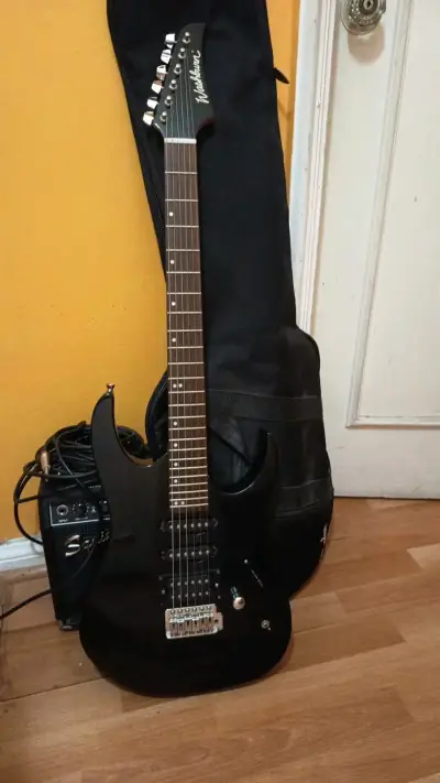 Guitarra eléctrica Washburn negra con amplificador - miniatura 1