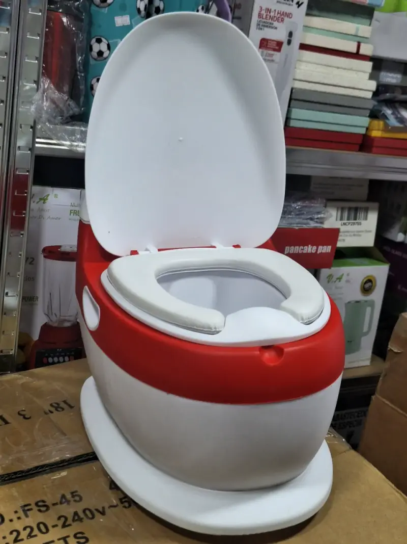 Bacinica infantil roja y blanca con asiento cómodo - 1