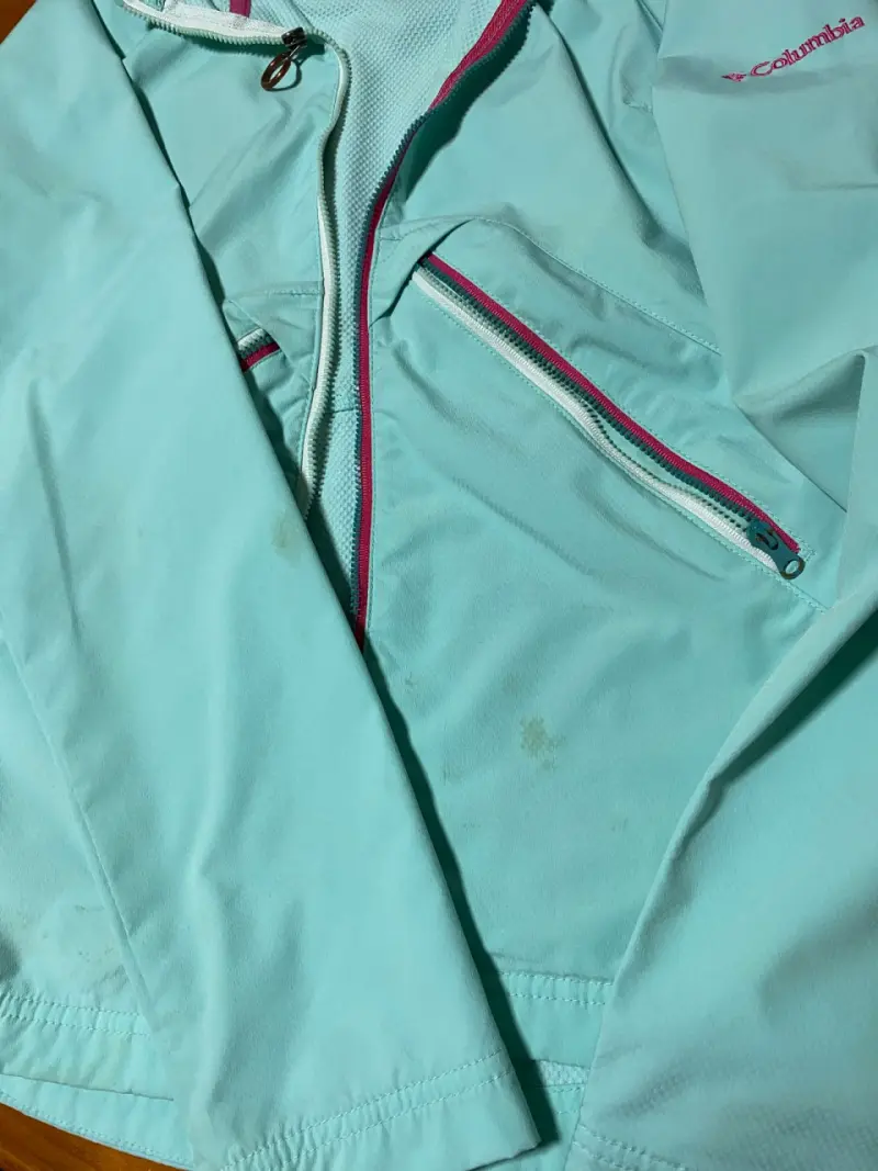 Chaqueta impermeable Columbia turquesa con capucha - 1