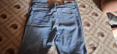 Jeans de mezclilla azul para mujer - miniatura 2