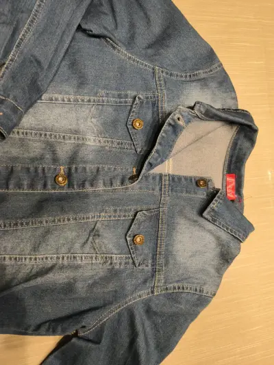 Chaqueta de mezclilla azul para mujer - miniatura 1
