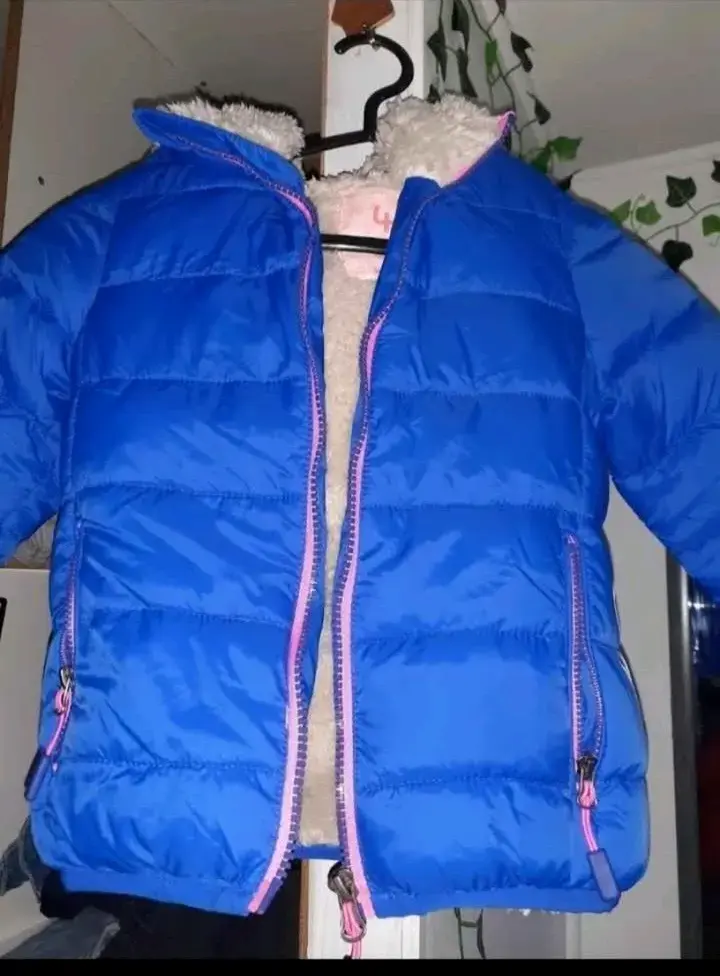 Chaqueta acolchada azul para niñas  con cierre