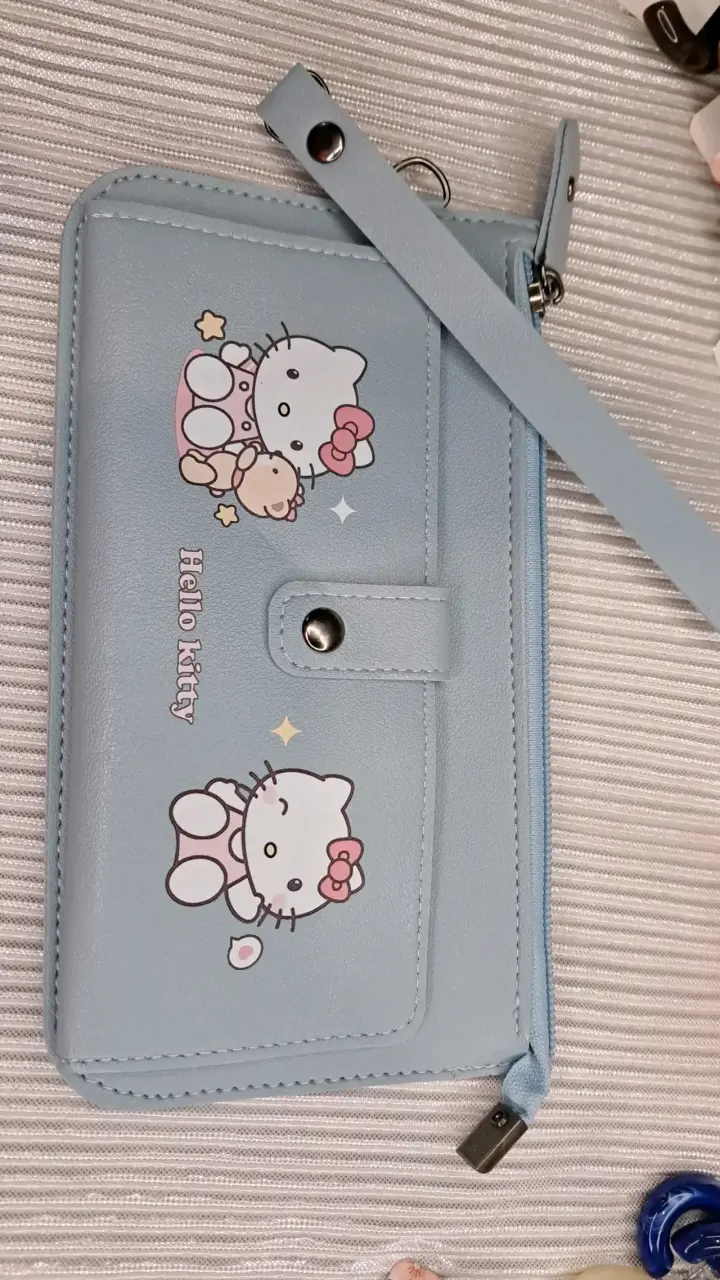 Cartera Hello Kitty azul con correa - 1