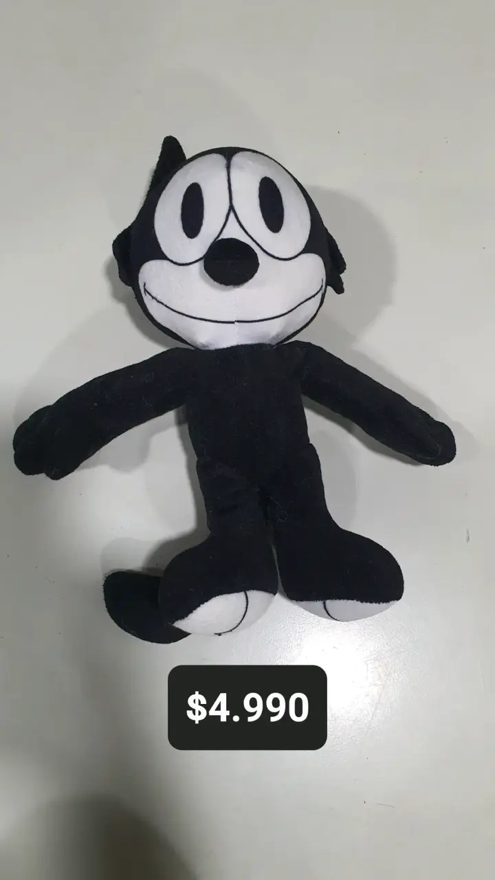 Peluche de felpa blanco y negro