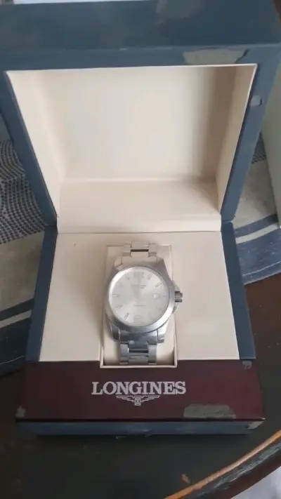 Reloj Longines de acero inoxidable en caja original - miniatura 1