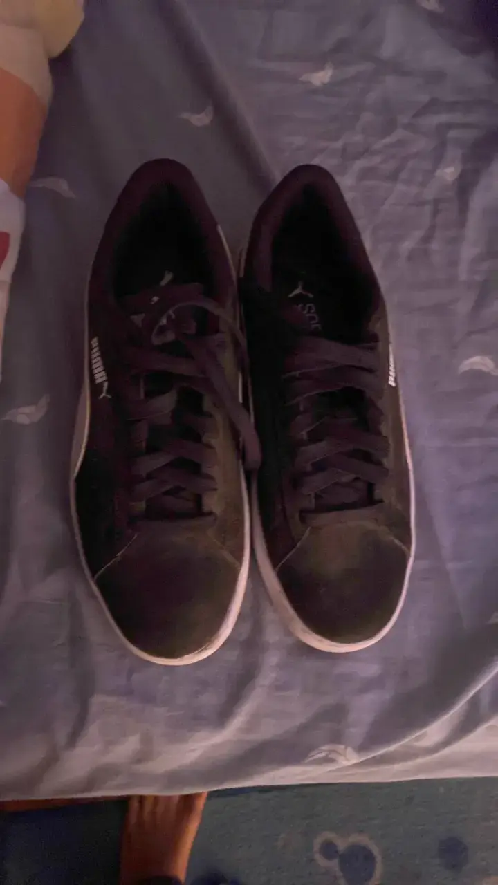 Zapatillas deportivas negras Puma en buen estado