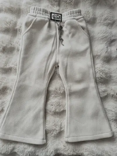 Pantalones de pana burdeos con detalles decorativos - miniatura 2