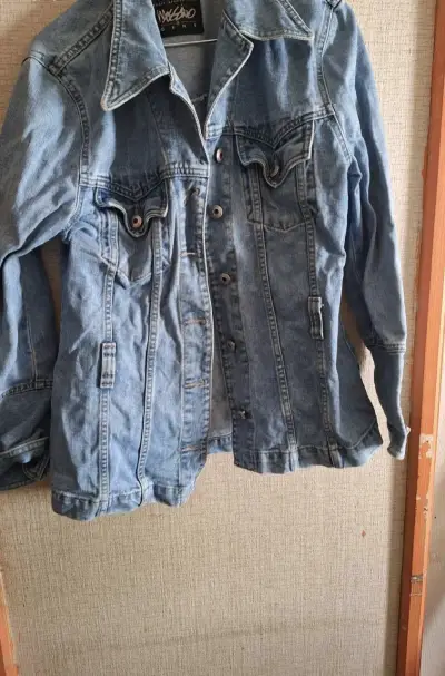 Chaqueta de mezclilla azul para mujer - miniatura 1