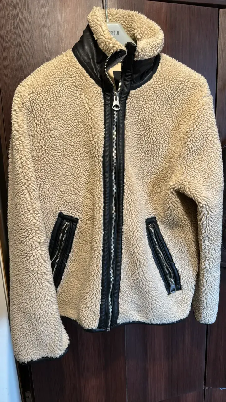 Chaqueta de lana sintética beige con detalles negros - 1