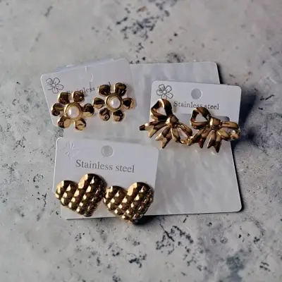 aros de acero inoxidable dorados y pulseras - miniatura 4